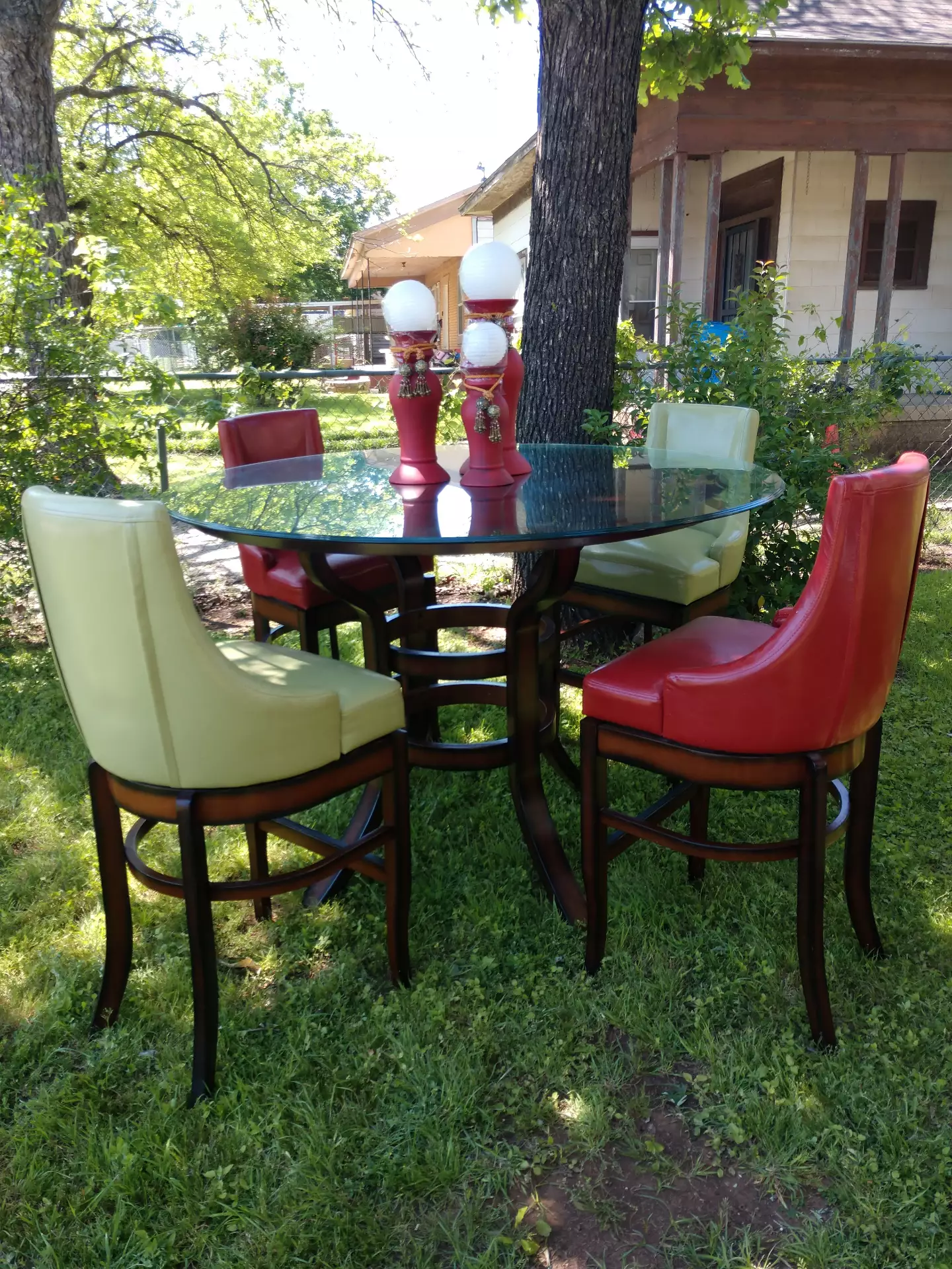 Photo High wood with glass table and barstools. Very nice.table 41 tall. 5 foot wide.
